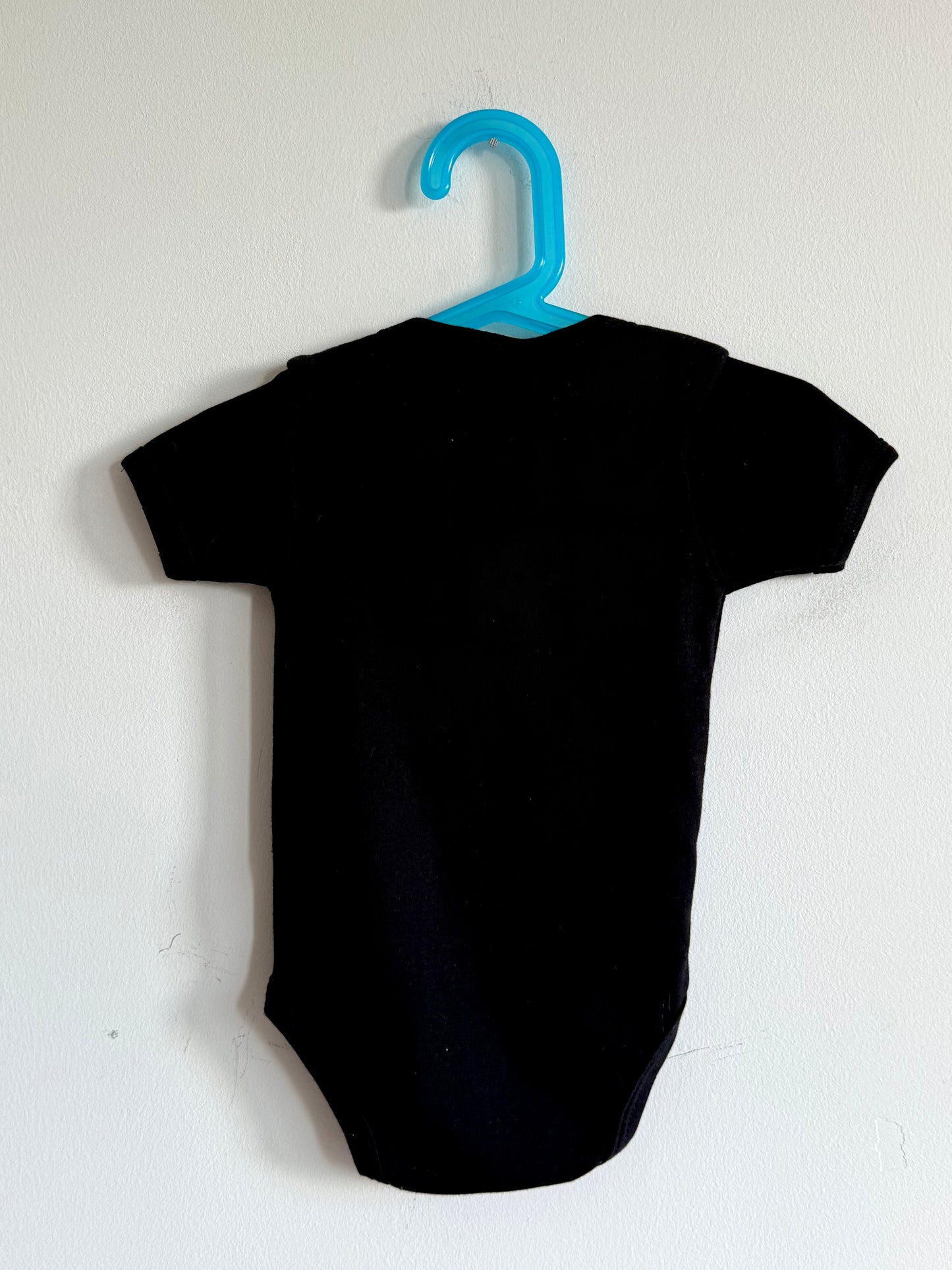 Skeleton print onesie