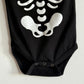 Skeleton print onesie