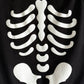 Skeleton print onesie